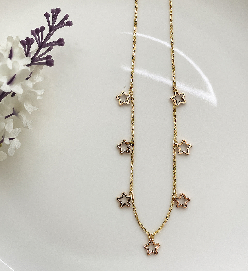 7 star gold plated necklace with white crystals